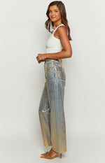 Side view of high-waisted wide-leg jeans with a metallic gold wash over blue denim