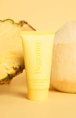 Yellow body cream tube with Coconut Pineapple Body Cream 50 mL text
