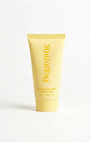 Beginning Boutique Coconut And Pineapple Body Cream (FREE over $180) yellow squeeze tube with 'Beginning Beauty' logo