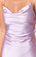 Close-up of the lilac satin cowl neckline and the draped bodice of a dress