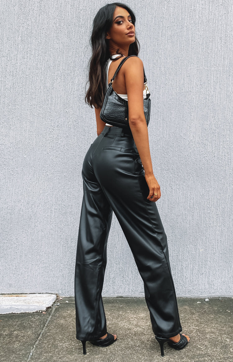 Black PU high-waisted wide-leg pants with a relaxed fit and ankle length