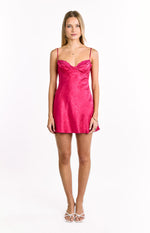 Pink satin mini dress with a fitted bodice, sweetheart neckline, and subtle floral jacquard pattern