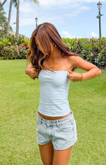Fitted light blue and white horizontal striped tube top with a straight strapless neckline