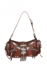 Glossy brown PU shoulder bag with silver hardware, central buckle strap, studded details, and crocodile-embossed panels