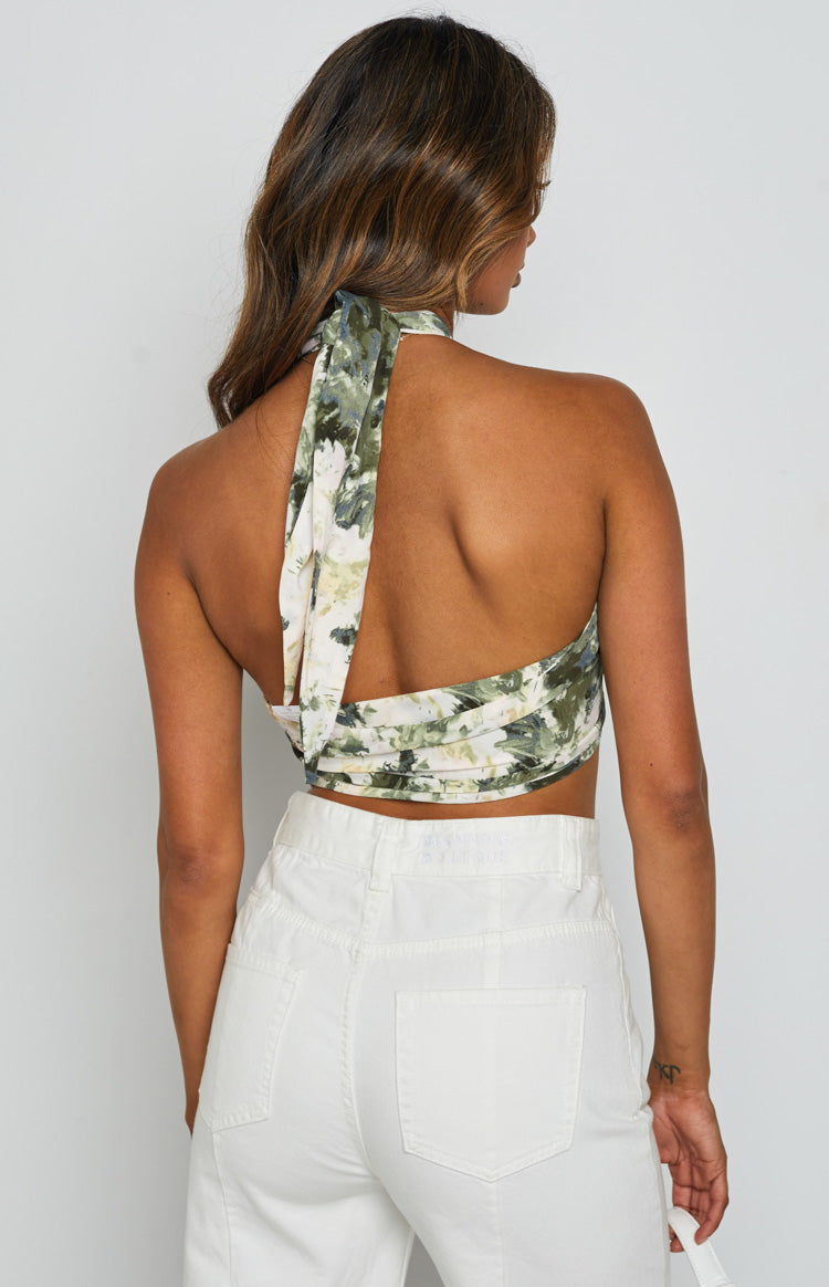 Lightweight multi-print scarf top featuring a tie-back halter neck and open back design