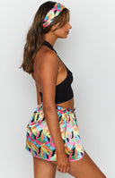 Tropical print satin wrap shorts with an elasticated drawstring waist and scalloped hem