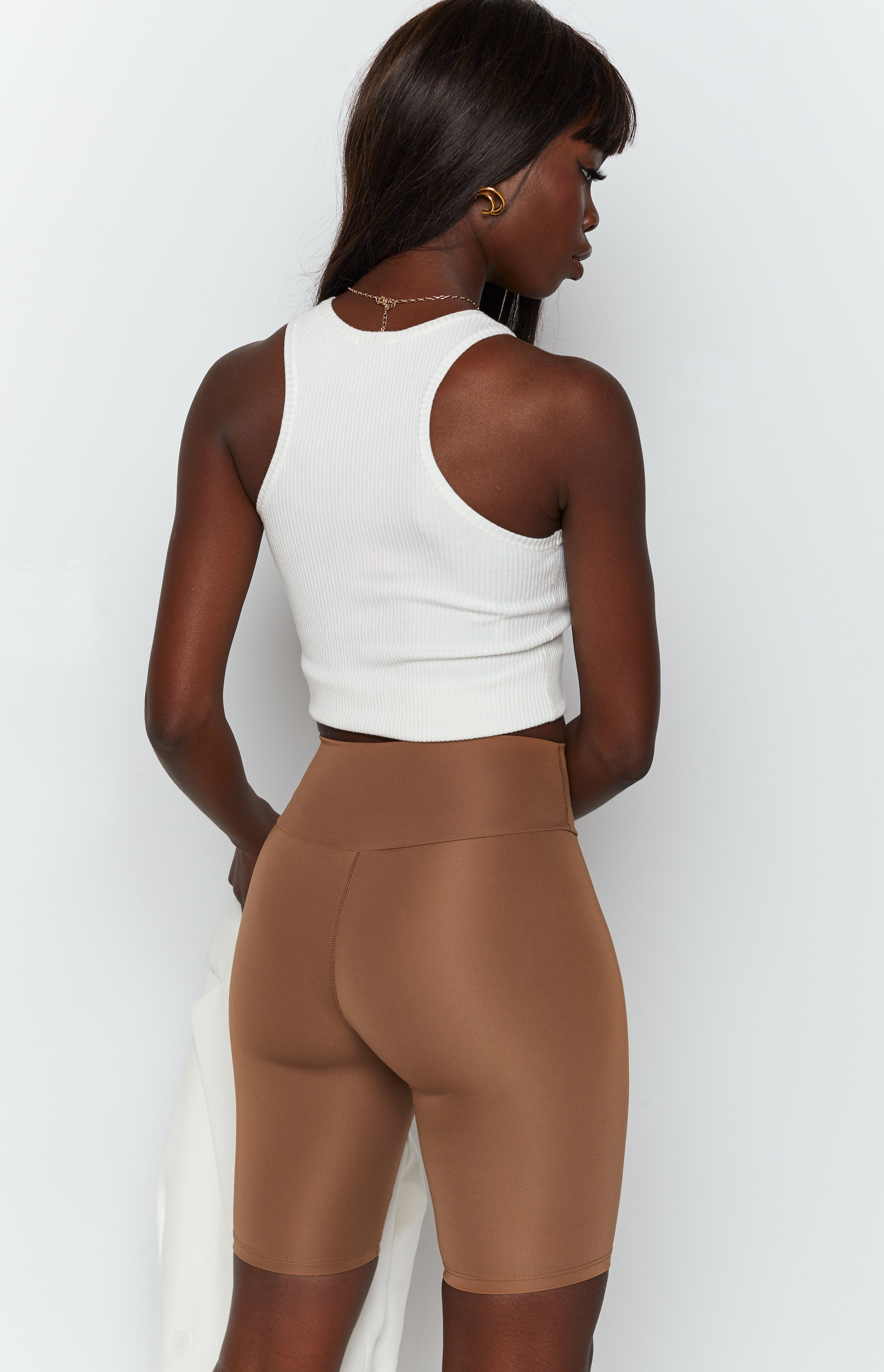 Smooth toffee bike shorts featuring a wide high-waisted band and embroidered BBX logo