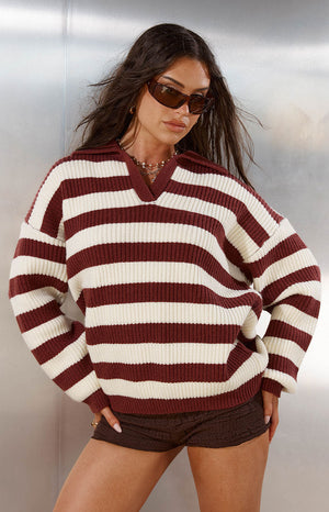 Girl in an oversized striped polo knit sweater a comfortable and stylish choice for a Spring Festival