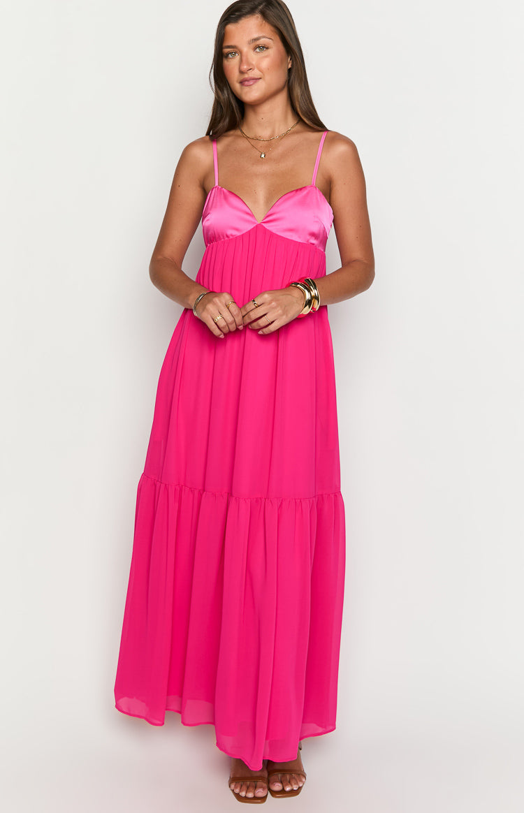 Hot pink maxi dress with a contrasting satin sweetheart neckline and a tiered skirt