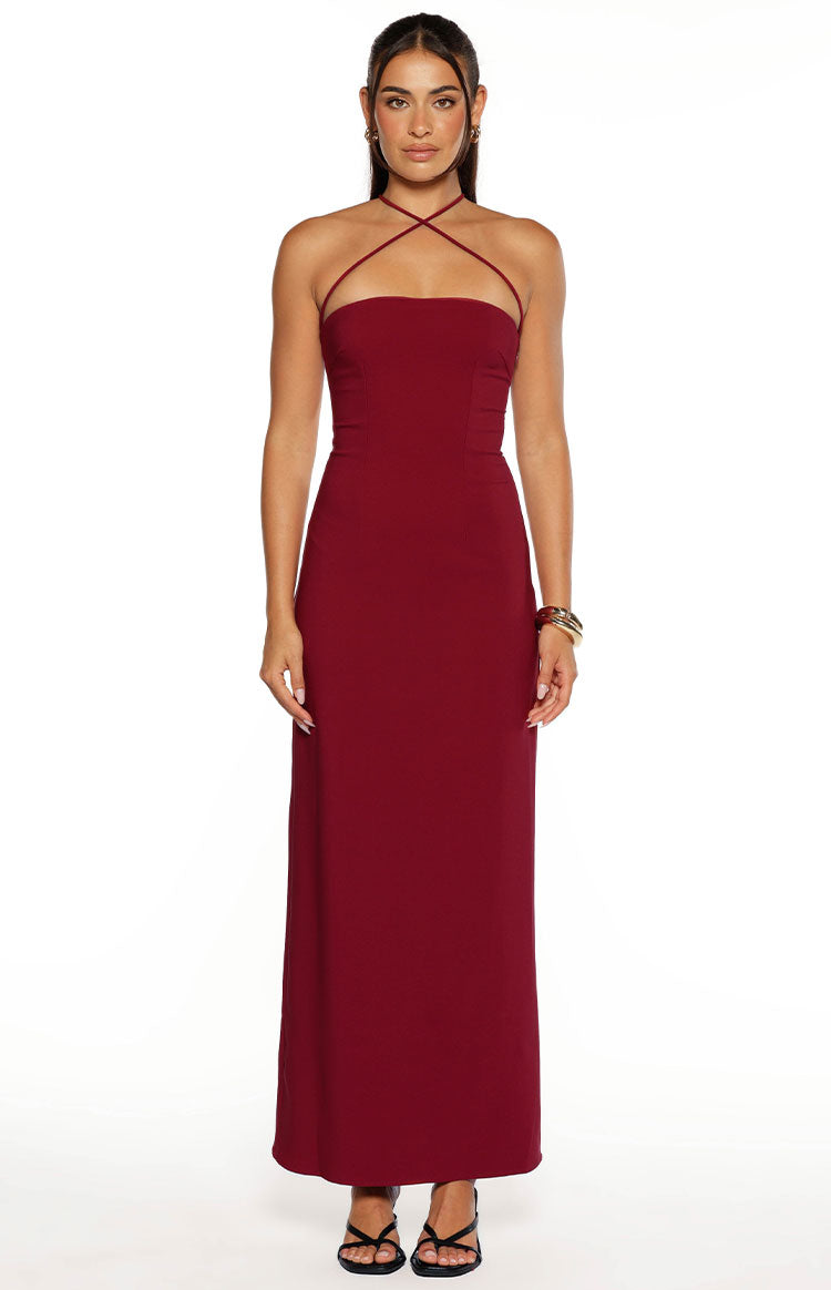 Full-length front view of a burgundy crepe maxi dress with a fitted bodice and criss-cross halter straps