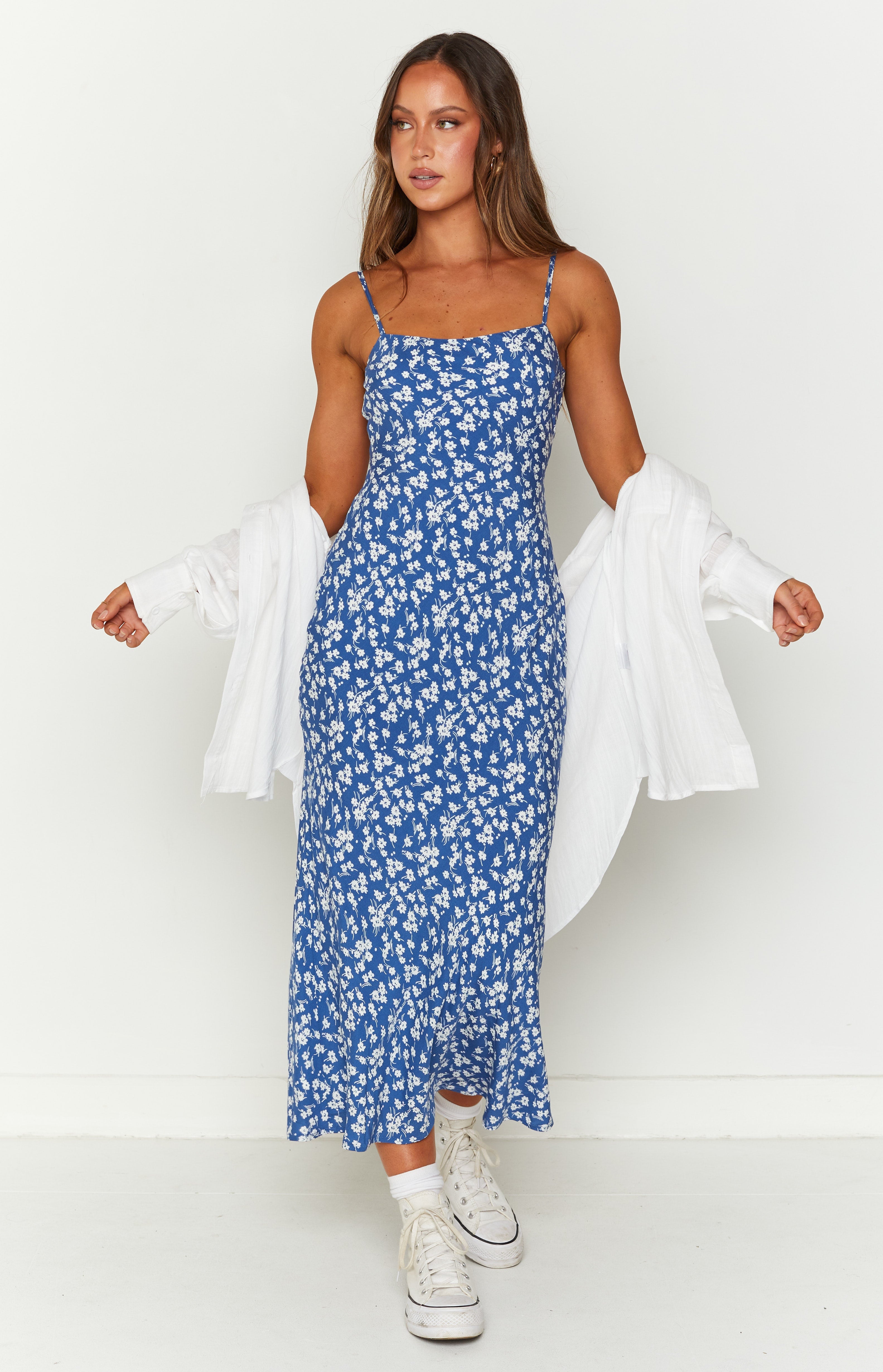 Blue floral midi dress with a square neckline and thin spaghetti straps