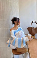 Beginning Boutique Delvey Light Blue Striped Chunky Knit Sweater cream striped chunky knit with wide V-neck and balloon sleev