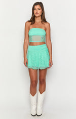 Teal strapless lace corset top with a sheer mesh panel across the midriff