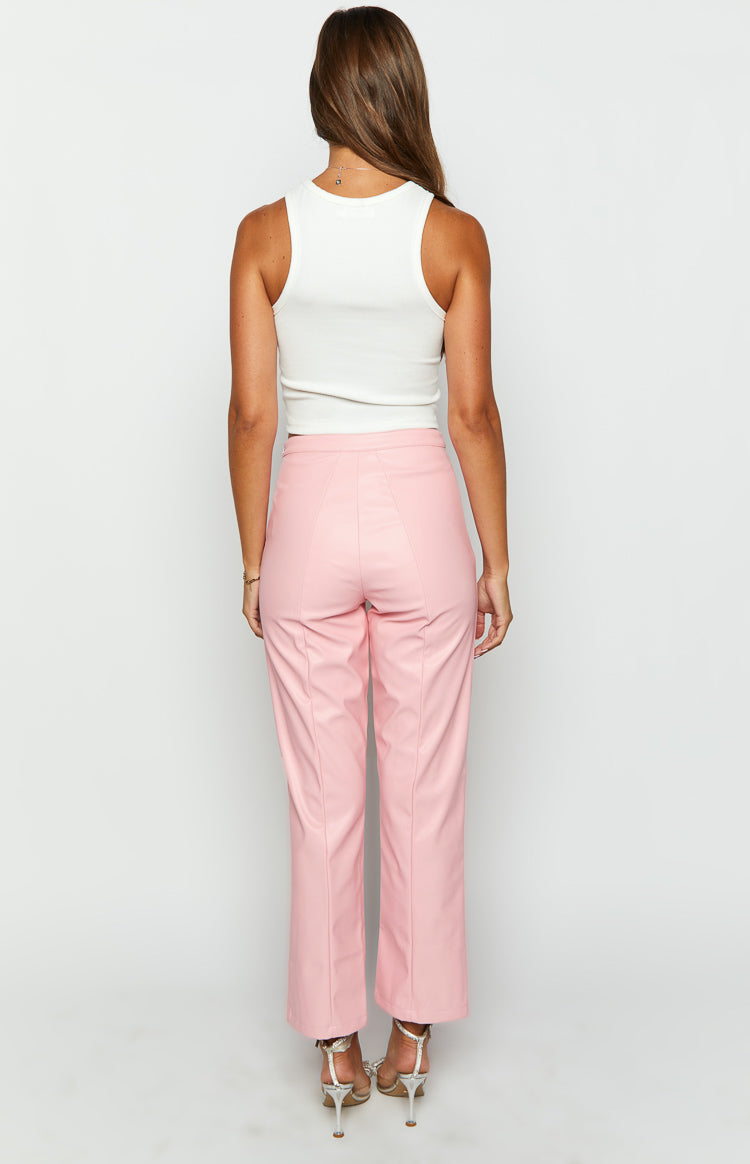 Rear view of pink PU leather pants with V-shaped back waist seam and vertical leg seams
