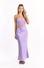 Front view of a lilac satin maxi dress with a strapless ruched mesh panel bodice and a diagonal waist cutout