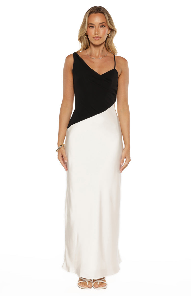 Black and white two-tone satin maxi dress with a diagonal colour block and an asymmetric cowl neck