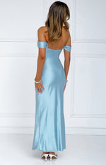 Rear view of a light blue satin off-shoulder maxi dress with a low scoop back and flowing skirt