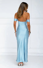 Rear view of a light blue satin off-shoulder maxi dress with a straight back and flowy skirt