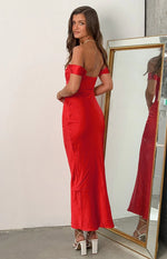 Side view of the red off-shoulder formal dress, showing the draped sleeves and fitted silhouette