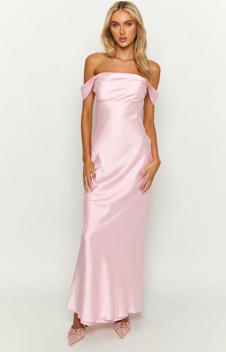 Full front view of a light pink off-shoulder satin maxi dress with draped sleeves and a fitted bodice