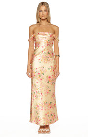 Yellow satin maxi dress with an off-shoulder cowl neckline, draped short sleeves, and pink floral print
