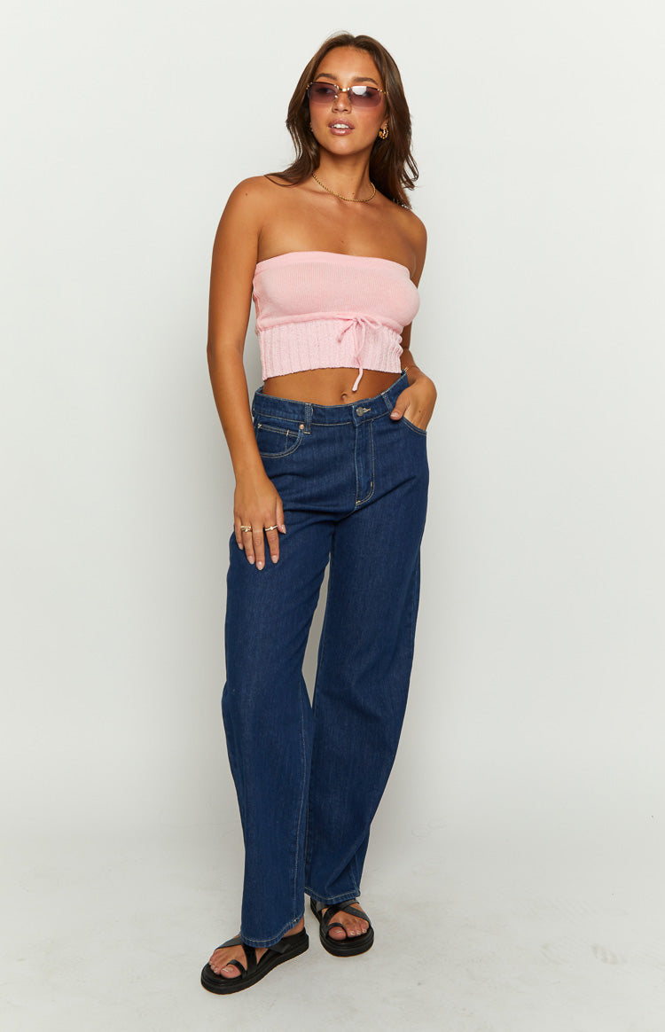 Pink knit tube top featuring a gathered front drawstring and a wide ribbed hem
