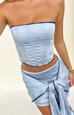 Beginning Boutique Elvi Blue Satin Corset Top light blue satin strapless corset top with boning and navy lace trim