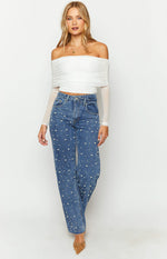 White off-shoulder crop top with a ruched bodice and sheer mesh long sleeves