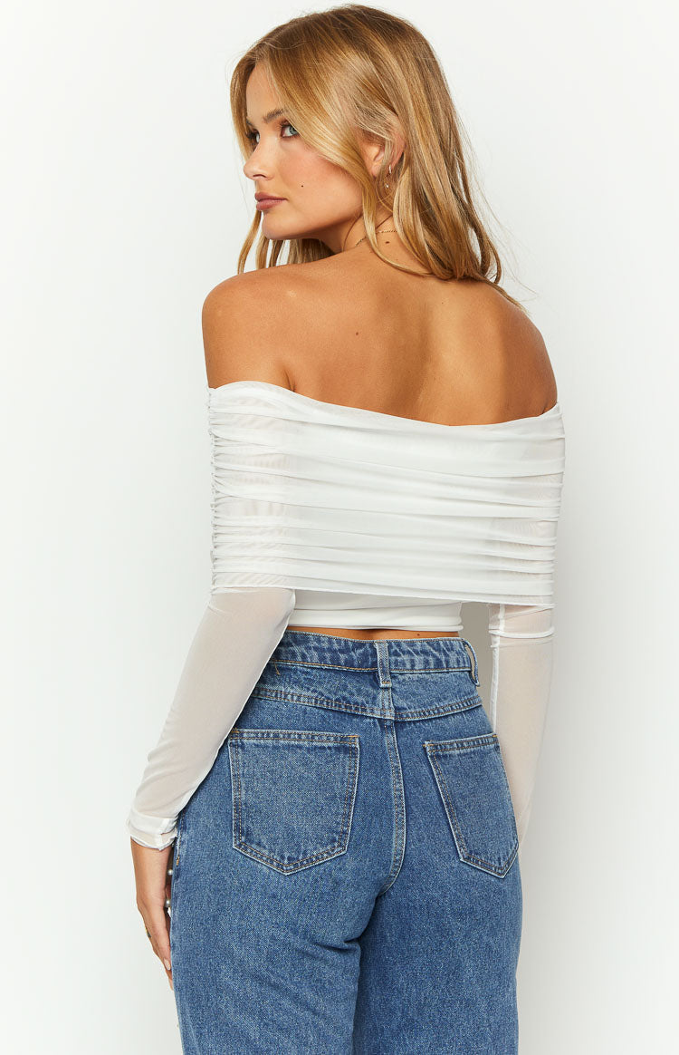Rear view of a white mesh off-shoulder crop top with ruched detailing across the back and long sheer sleeves