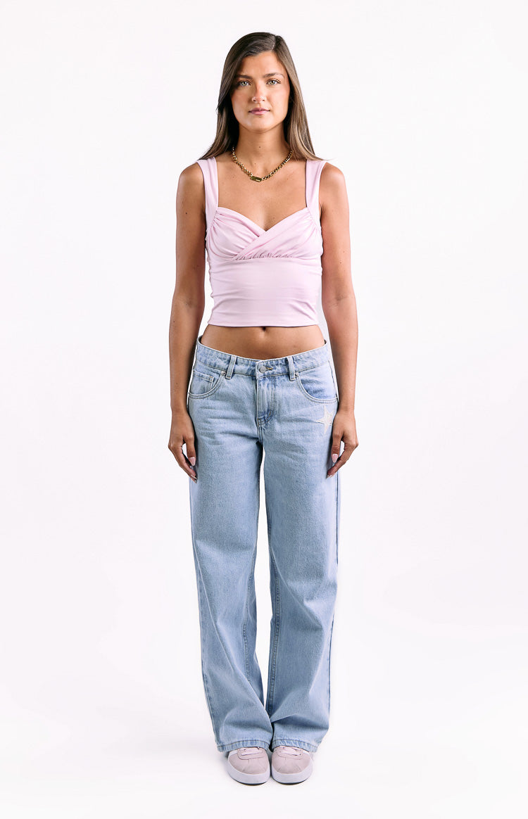 Pink cropped top with wide shoulder straps and a ruched sweetheart neckline