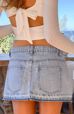 Emmy Light Wash Denim Distressed Mini Skirt Image
