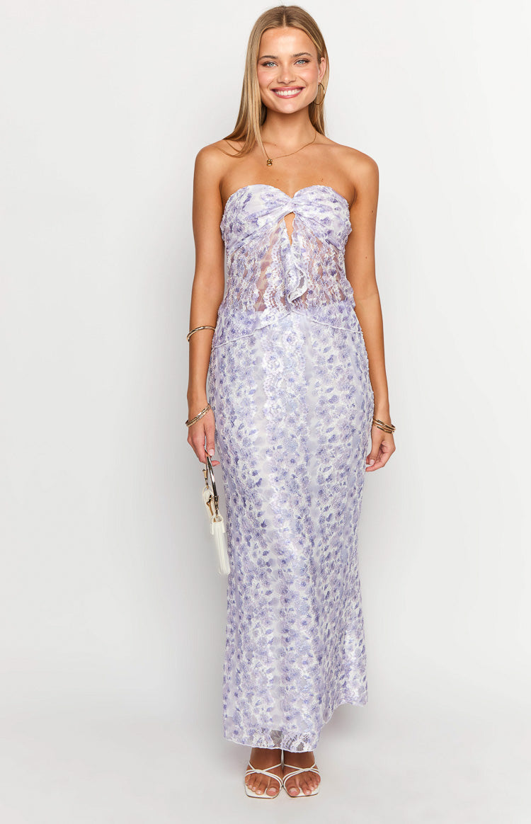 Faint purple floral lace maxi skirt with a fitted silhouette and straight cut falling to the ankles