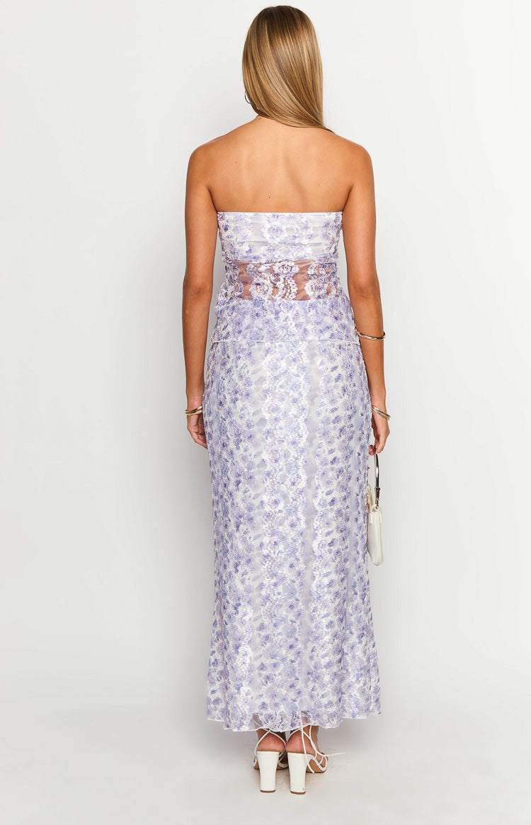 Rear view of the faint purple lace maxi skirt, showing its straight silhouette and intricate floral pattern