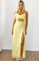 Front view of a yellow sequin maxi dress featuring a midriff cutout, cowl neck, and high thigh slit
