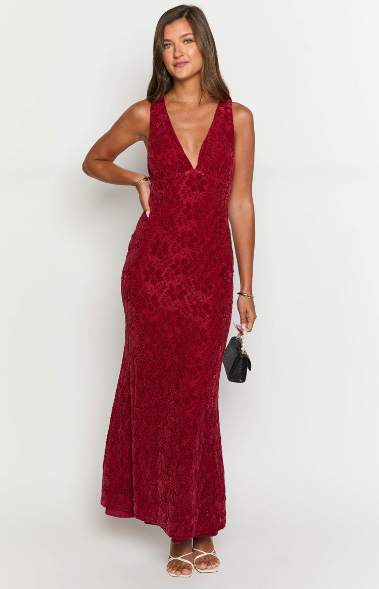 Full length view of a red floral lace maxi dress with a deep V-neck and a bodycon fit that gently flares