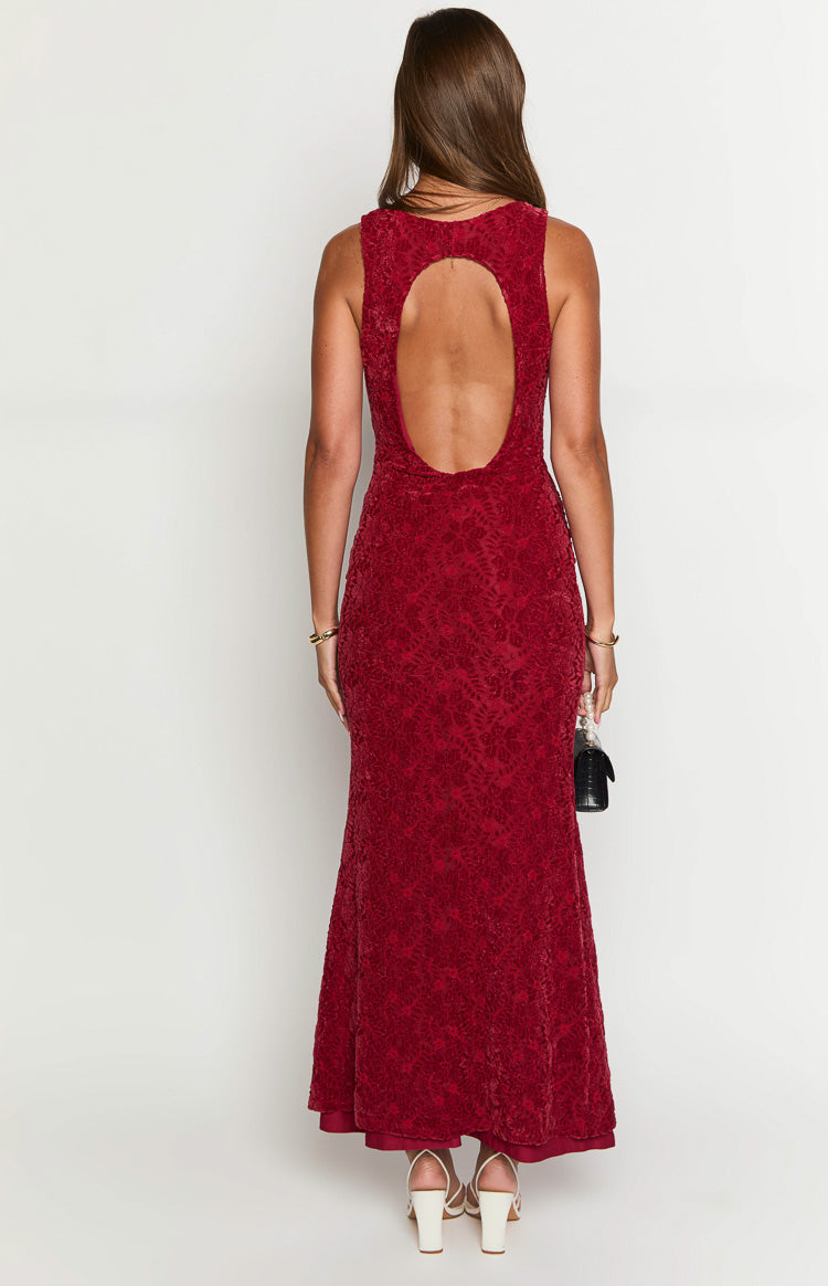 Rear view of the red lace maxi dress with an oval cutout at the upper back and a low scoop back