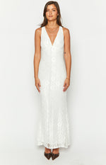 Front view of a white sleeveless maxi dress with a deep V-neck and all-over floral lace