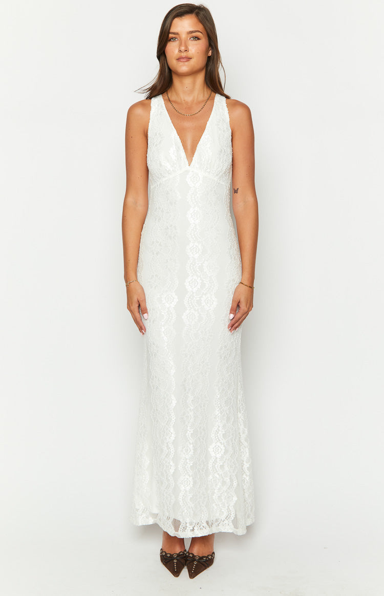 Front view of a white sleeveless maxi dress with a deep V-neck and all-over floral lace