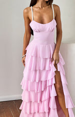 Pink maxi dress with pearl straps, a sweetheart neckline, fitted bodice, and a tiered ruffle skirt with a high slit