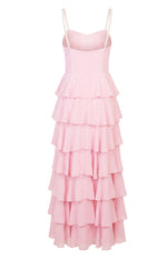 Rear view of a pink maxi dress with pearl straps and a full tiered ruffle skirt