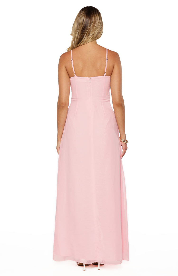 Rear view of a pink maxi sleeveless dress with adjustable spaghetti straps and an invisible back zipper