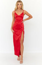 Front view of a red satin V-neck maxi dress with spaghetti straps and a high side slit
