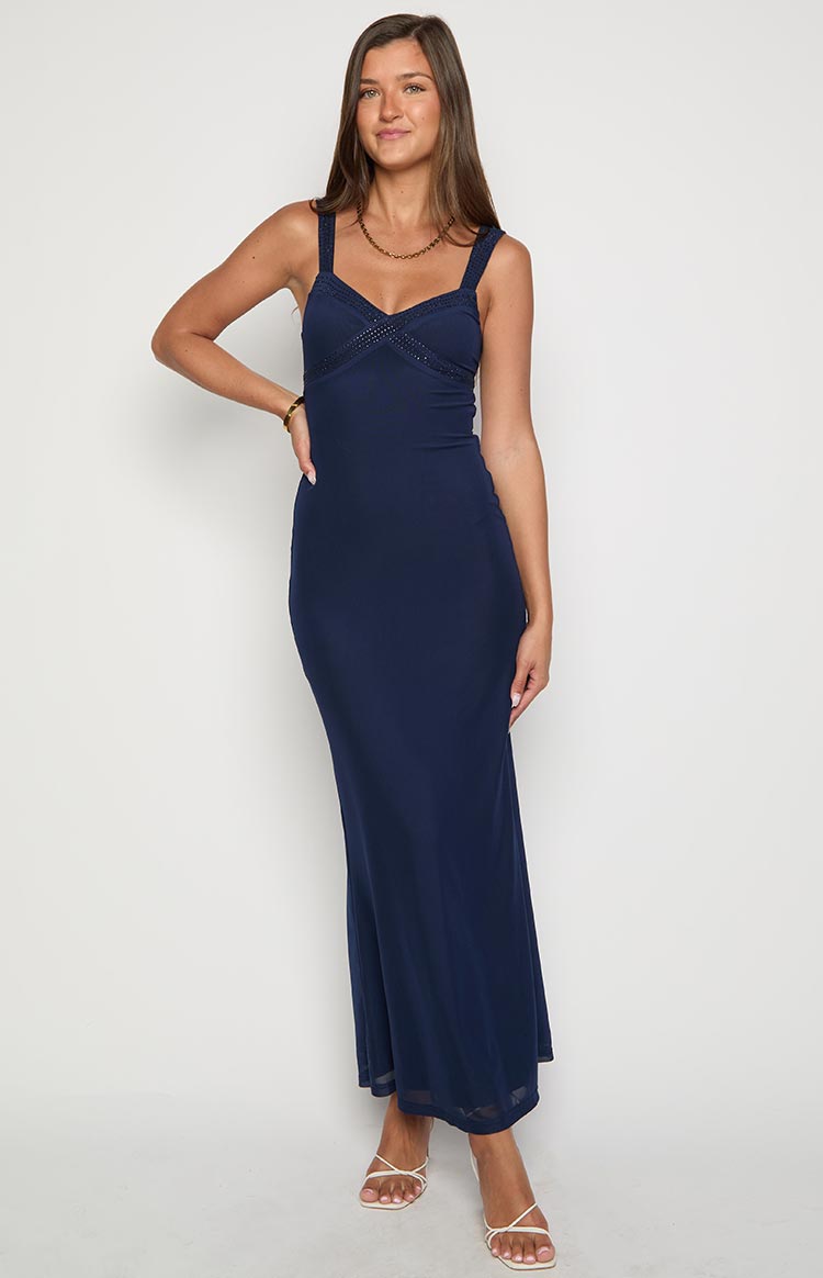 Front view of a navy mesh maxi dress with a sweetheart neckline and criss-cross mesh detail on the bust