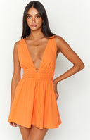 Beginning Boutique Genovia Crinkle Orange Mini Dress orange crinkle sleeveless mini dress with wide straps open back and elasticated waist