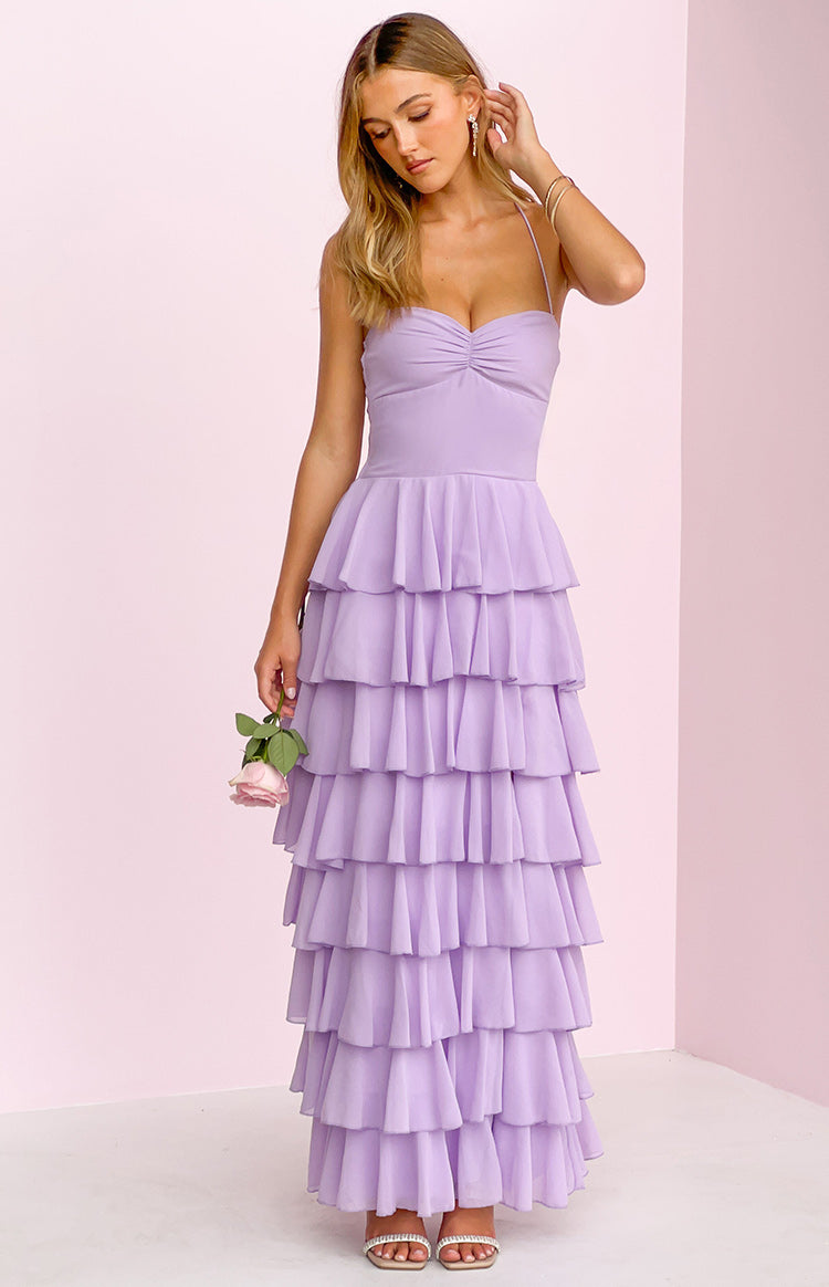 Front view of a lilac maxi dress with a ruched sweetheart neckline and tiered ruffle skirt