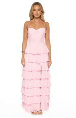 Pink maxi dress with a ruched sweetheart bust, delicate halter straps, and a tiered ruffle skirt with a high leg slit