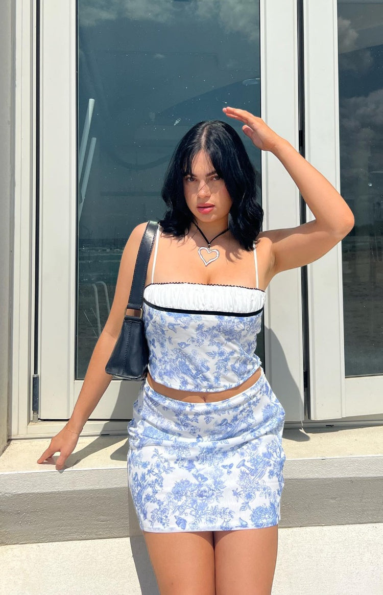 Beginning Boutique Gianna Blue Print Mini Skirt blue and white toile print fitted mini skirt with ruched side detail