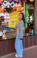 Full length light wash denim low rise wide leg jeans