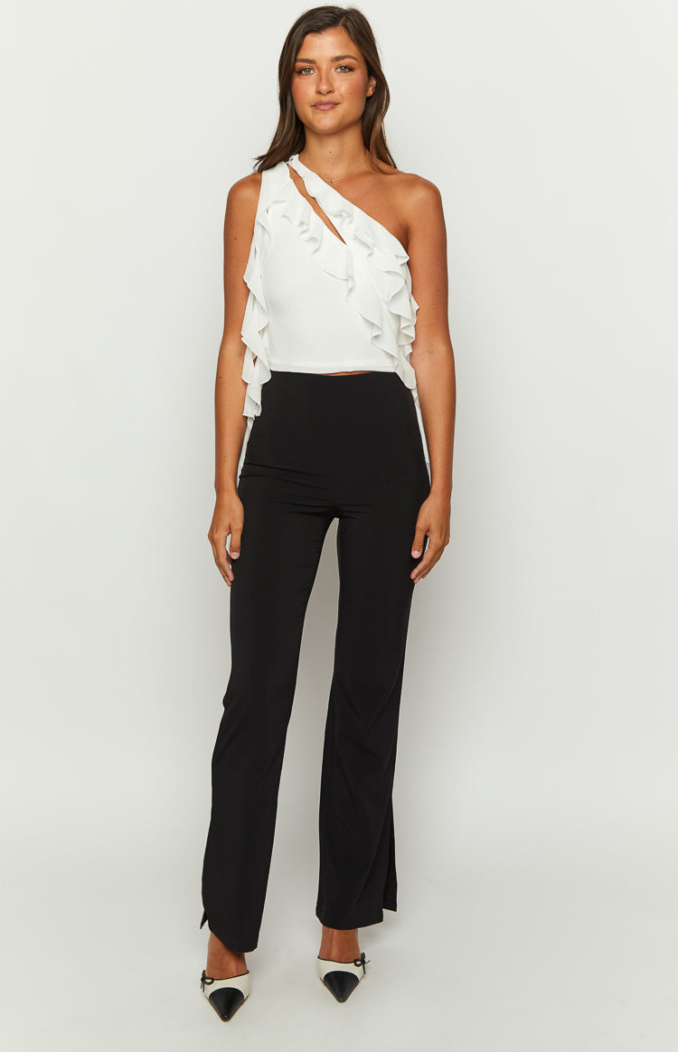 White ruffle one shoulder top with a cutout detail and cropped fit
