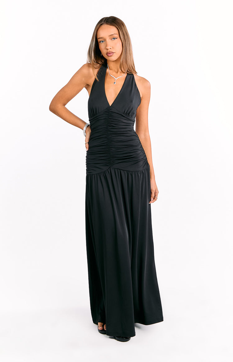 Black halter neck maxi dress with a deep V-neckline and extensive ruching through the bodice and waist, flowing skirt